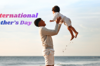 A father joyfully lifting his child in the air on a beach during sunset, with the text "International Father's Day," symbolizing love, trust, happiness, and the special bond between a father and child.