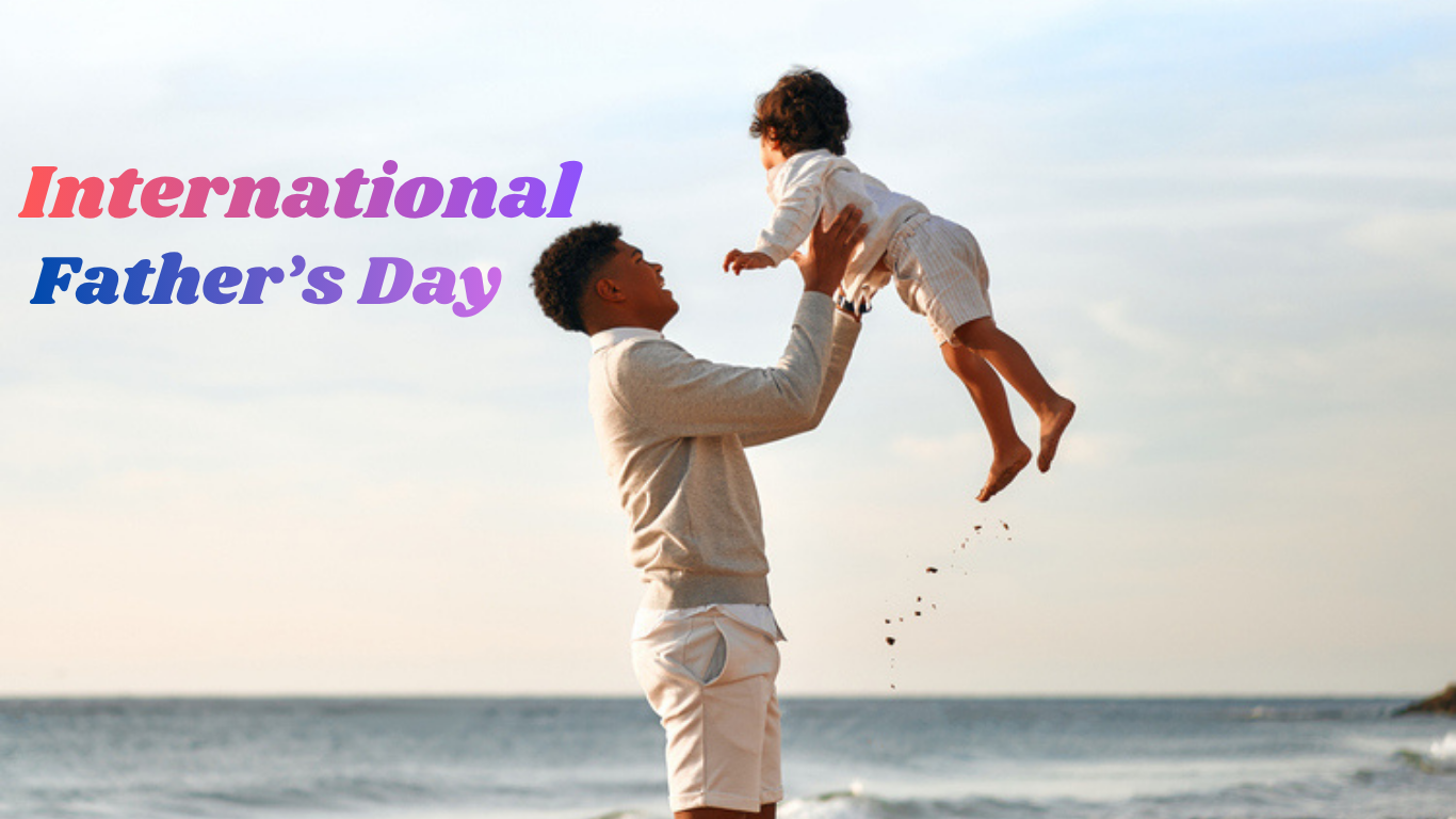 A father joyfully lifting his child in the air on a beach during sunset, with the text "International Father's Day," symbolizing love, trust, happiness, and the special bond between a father and child.