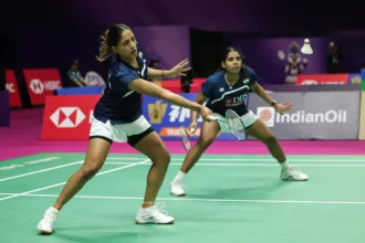 Trisha Jolly and Gayatri Gopichand in action during a women’s doubles badminton match, representing India on the international stage.