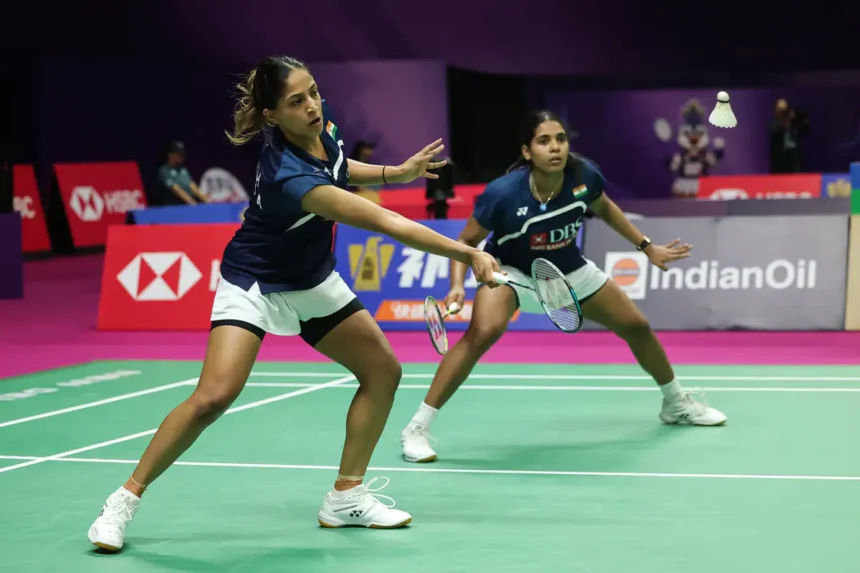 Trisha Jolly and Gayatri Gopichand in action during a women’s doubles badminton match, representing India on the international stage.
