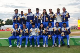 Indian women’s cricket team posing with gold medals after winning the Asian Games 2026 final