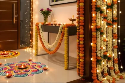 Festive home decorated with marigold flowers, diyas, rangoli and warm lights
