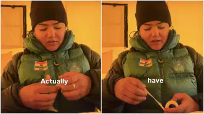 Mountaineer Yogeshwari uses tissue paper and doctor tape to make a temporary pad during a mountain expedition.
