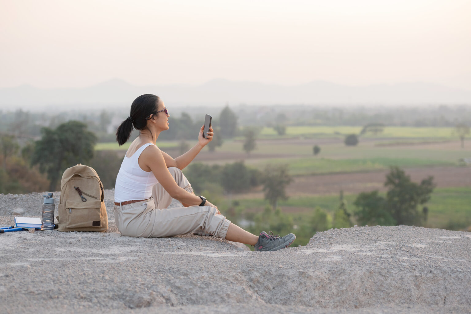 A traveler enjoying a peaceful slow travel experience amid the scenic natural beauty of India.